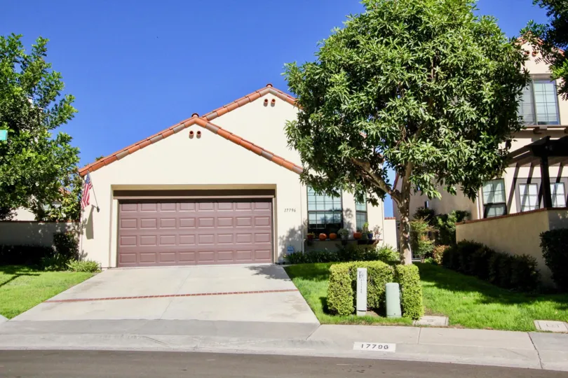 Single story home with brown garage door inside Eastview in Rancho Bernardo CA