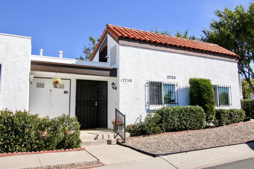 Residential unit with security bars on it's windows at Haciendas in Rancho Bernardo CA