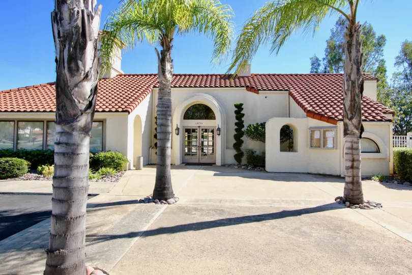 Sunny day at Las Brisas with Palm trees and sand in Rancho Bernardo, California.