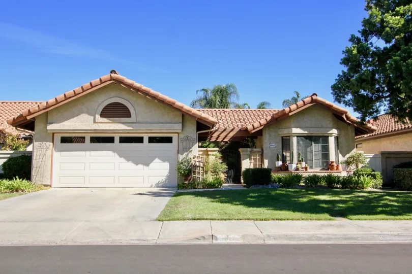 A beautifully landscaped Spanish style home in Las Flores in Rancho Bernardo, California.