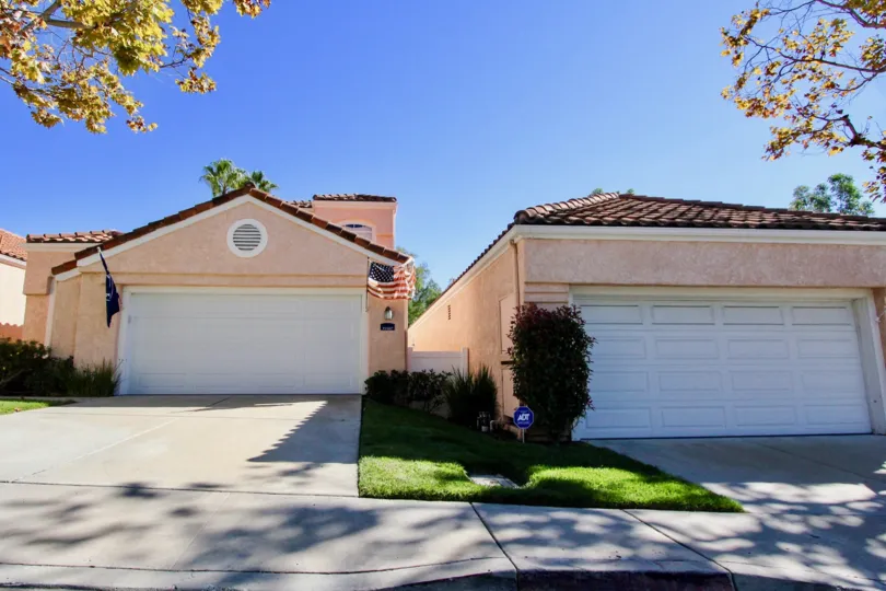 A sunny day with the flag waving at the Masters Hill house in Rancho Bernardo, California.