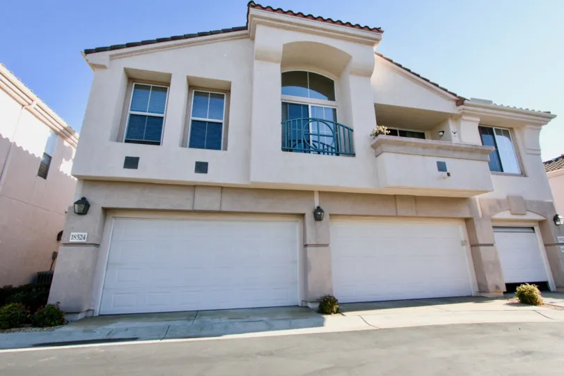 Mira Lago, City: Rancho Bernardo, backside of a building and two car sheds closed