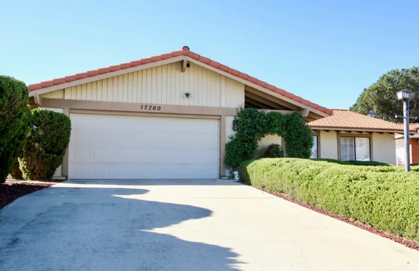 Paved driveway leading up to residence inside Oaks North in Rancho Bernardo CA
