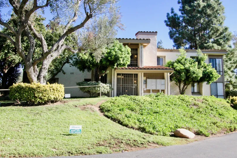 Hillside in front of a residential building at One Oaks North in Rancho Bernardo CA