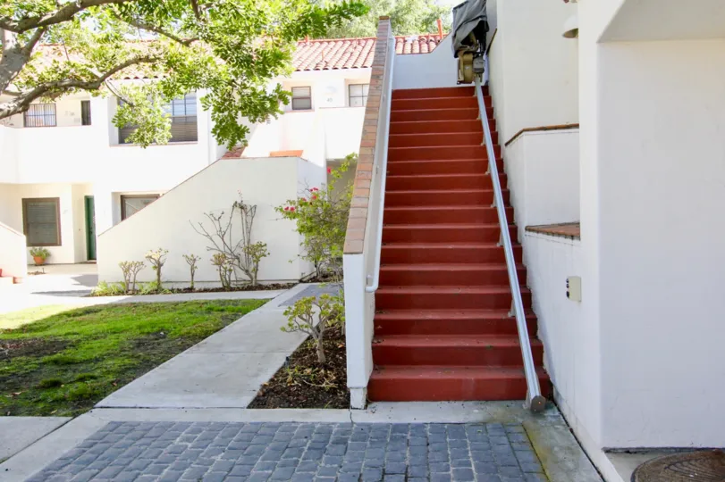 In palazzo Bernardo, a villa with steps and flower pots