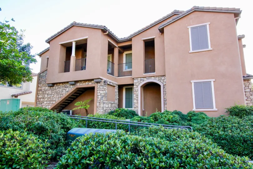 A two story property with various buses and stone detail in Savannah Terrace