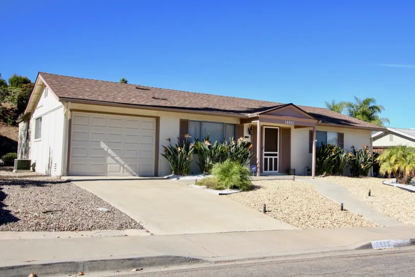 Home in Seven Oaks has great landscaping with nice rock
