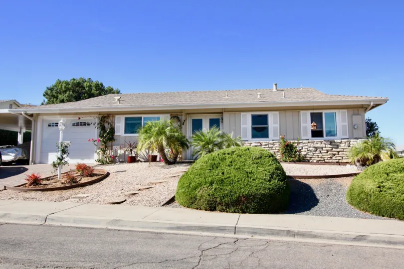 Single story home with many windows in Seven Oaks at Rancho Bernardo CA