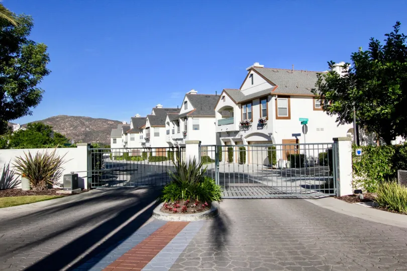 A gated neighborhood in Sitella with some landscaping