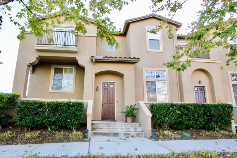 Brown front door on residential building at Sycamore Walk in Rancho Bernardo CA
