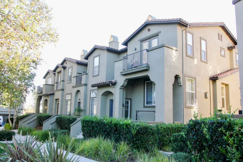 In Sycamore walk, Villas with bushes and plants in front of door