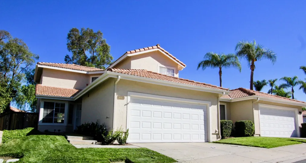 Two white garages inside Tierra Del Sol in Rancho Bernardo CA
