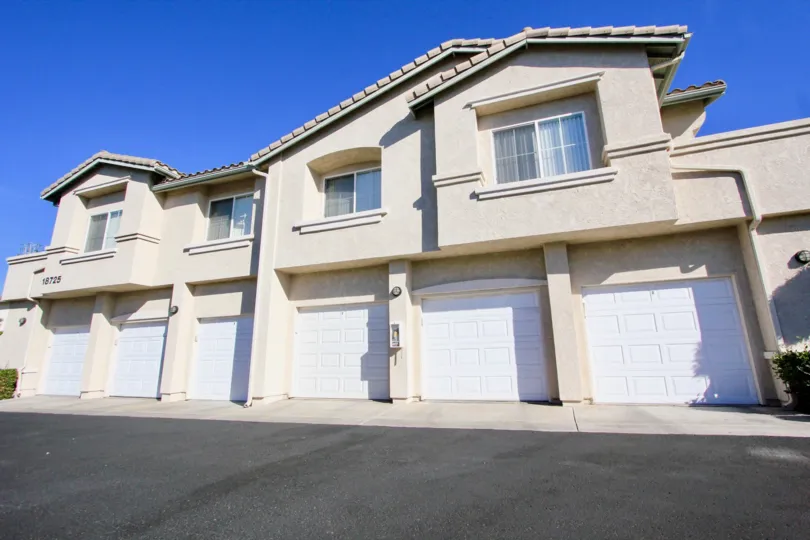 A sunny day in Vista Del lago has apartments with doors numbered as 18725