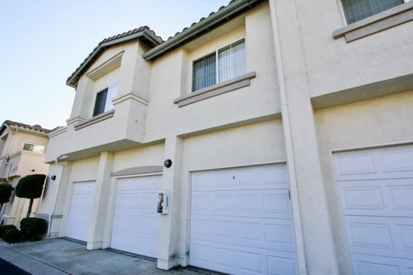 White garage doors on garages attached to units at Vista Del Lago in Rancho Bernardo CA