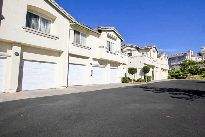 Big house with trees and garden located in Vista Del Lago, Rancho Bernardo California
