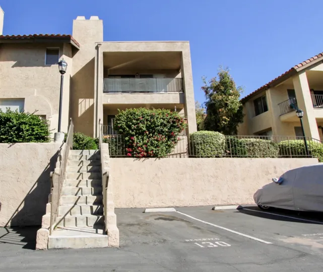 Avocado Gardens beige two-story with stairway San Marcos California