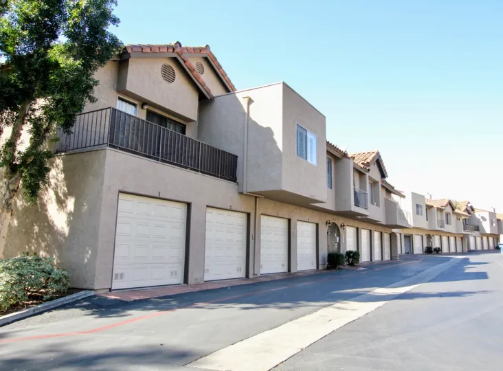 Avocado Gardens beige two-story with stairway San Marcos California