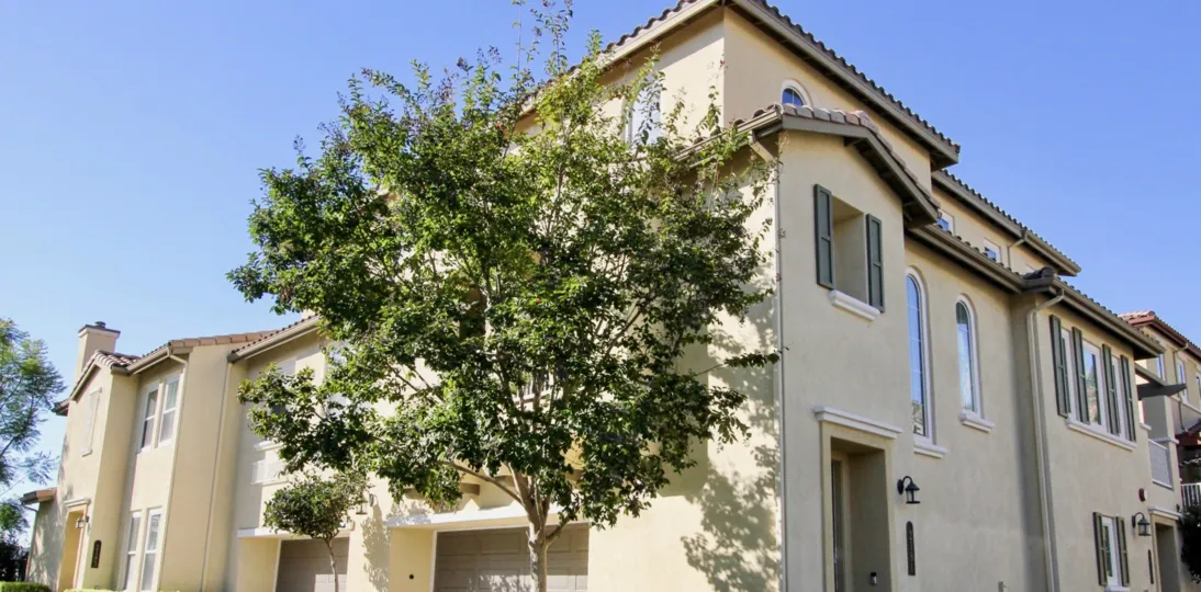 Two story housing with tree at Calico Bluffs in San Marcos Califonia