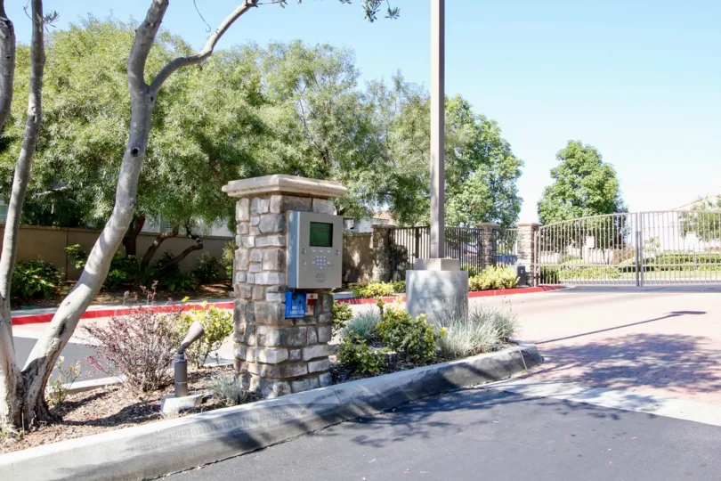 Sunny Day showing the entrance gate intercom of Campana Community in San Marcos, California