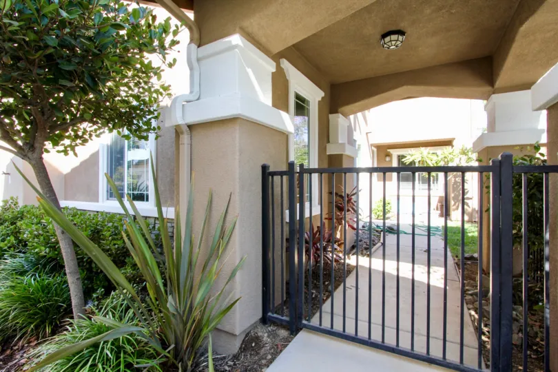 Interior courtyard view of the Carriage Walk apartments in San Marcos, California