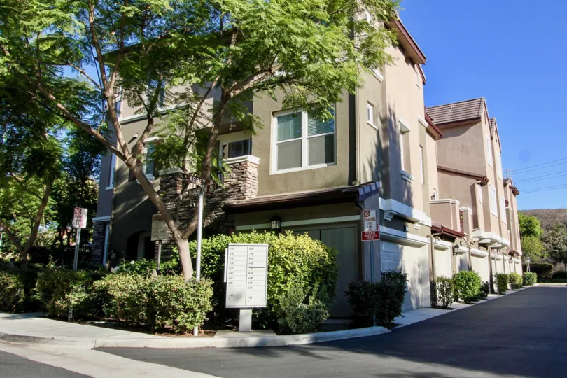 A corner views of three-storey townhouses in the Creekside Cottages community.