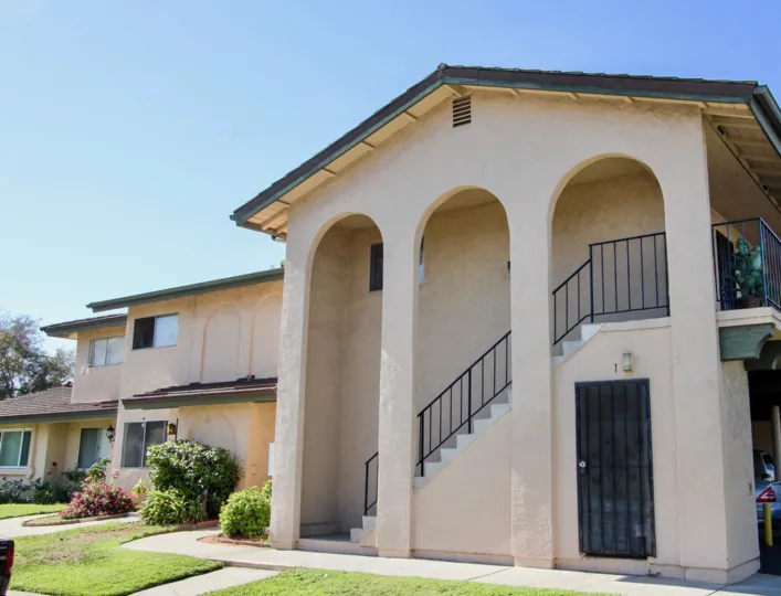 Two story housing with four pillars in Lake Park Villas in San Marcos CA