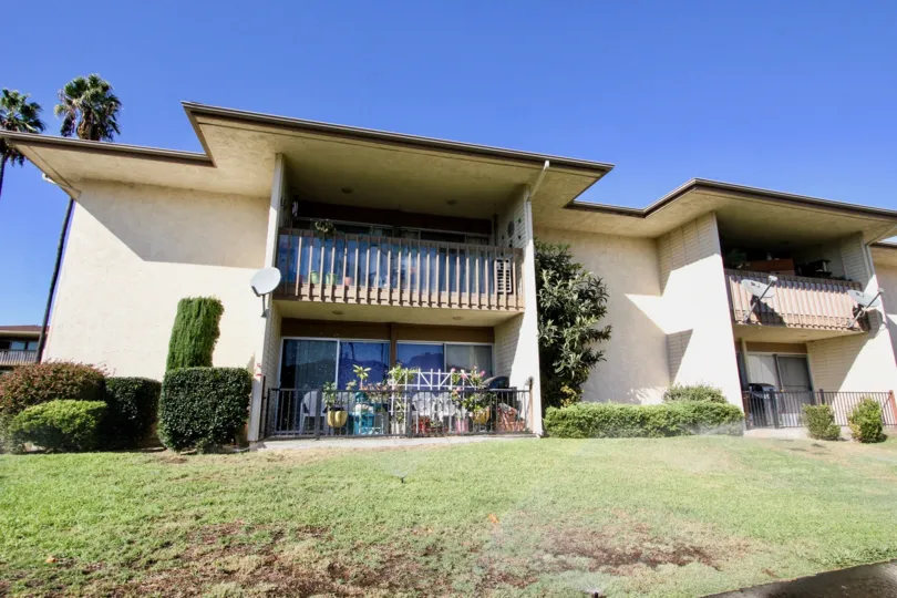 Two story building with balcony railing in Lake San Marcos Condos in San Marcos CA