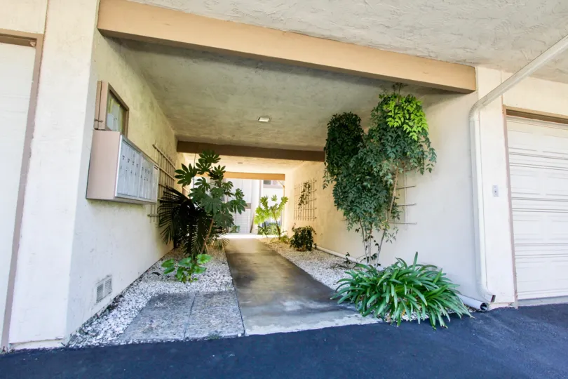 A ground level walkway under housing units in Lake San Marcos Condos community.