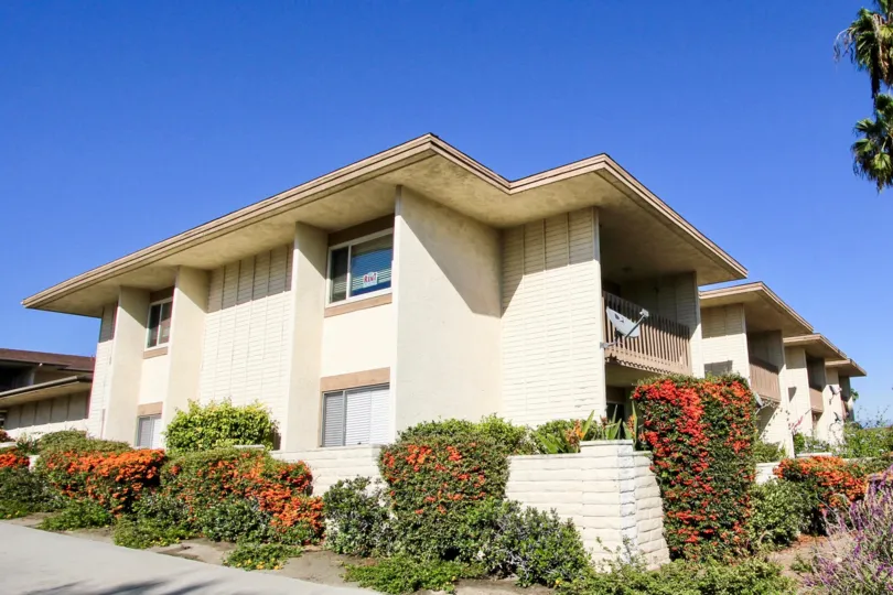 A two-storey townhomes with corrugated walls in Lake San Marcos II neighborhood.
