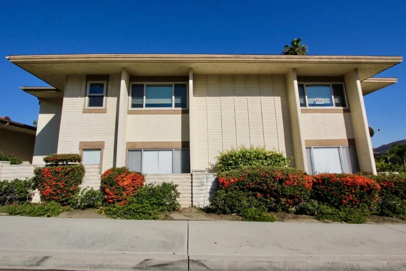 Lake San Marcos III two-story beige building with landscaping San Marcos California