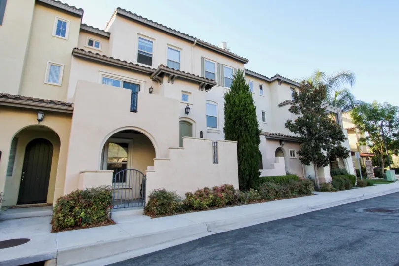 Three story condo homes with arches at the Larkspur Creek in San Marcos CA