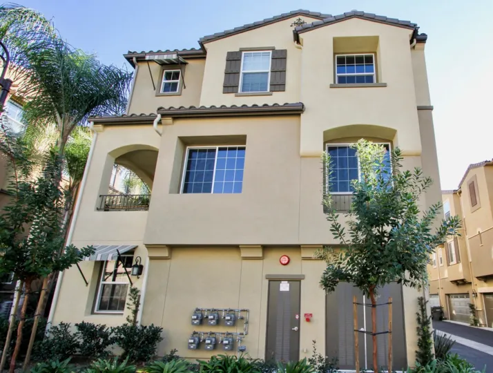 Housing unit with blue tinted windows at Magnolia in San Marcos CA