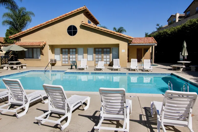Swimming pool with sun bath along party tables of Mission Park.