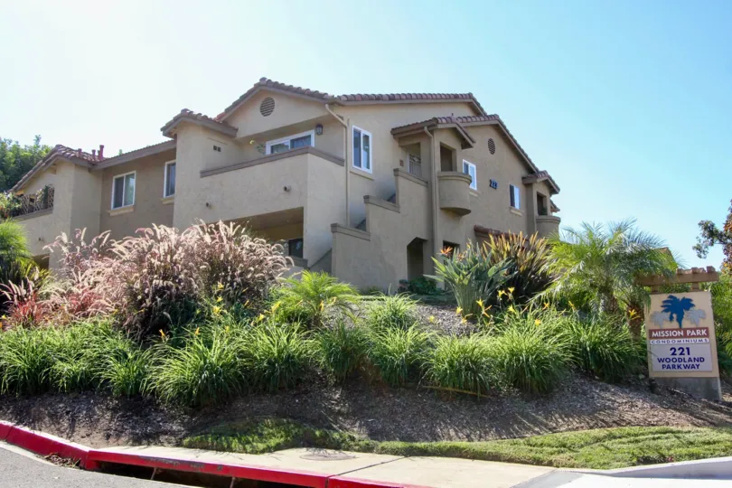 A GREEN PARK WITH THE HOUSE SITUATED ON HIGH HILL IN MISSION PARK
