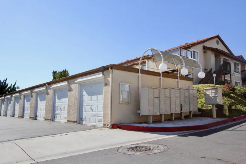 A bright blue sky and garage access for the Sommerset By the Lake in San Marcos California
