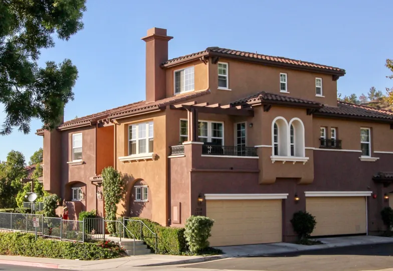 A sunny day in the area of Westridge, outside, condo, balcony, tree, chimney