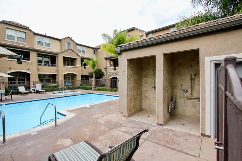 Shower area overlooking lounge and sparkling pool and jacuzzi area in the Aubrey Glen community of Santee.