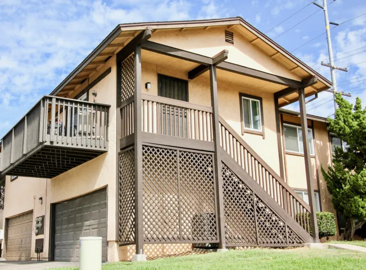 Carefree East Community Santee California attractive garage apartment with balcony and stairs over garage
