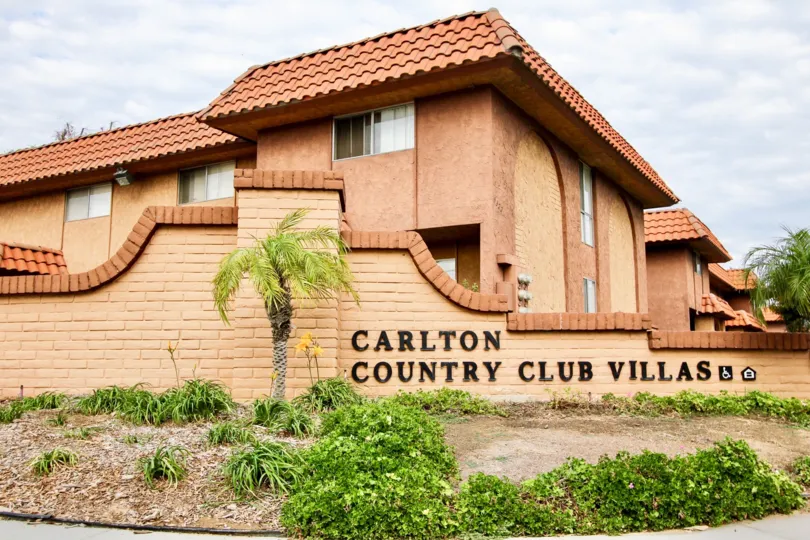 A view of the Carlton Country Club Villas welcome sign in Santee California