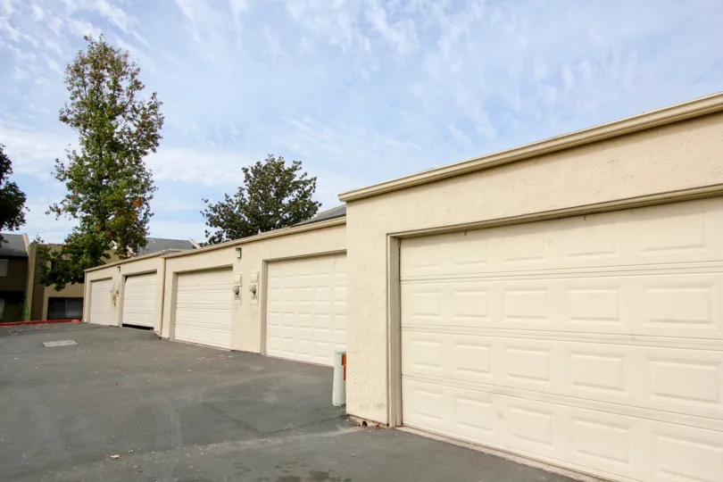 Long shot of light yellow garage doors in Santee, California