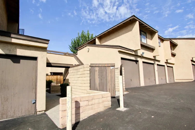 A sunny day in the area of Lakeview Carlton Hills, condos, light post, door, driveway