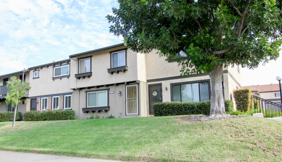 A sunny day in the area of Magnolia Meadows, condo, tree, grass, gated door