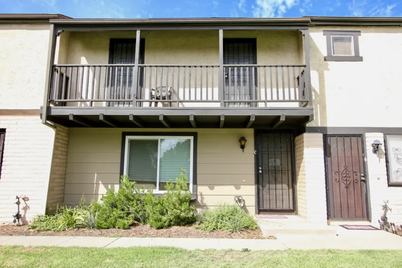 A sunny day in the area of Magnolia Meadows, condo, tree, grass, gated door