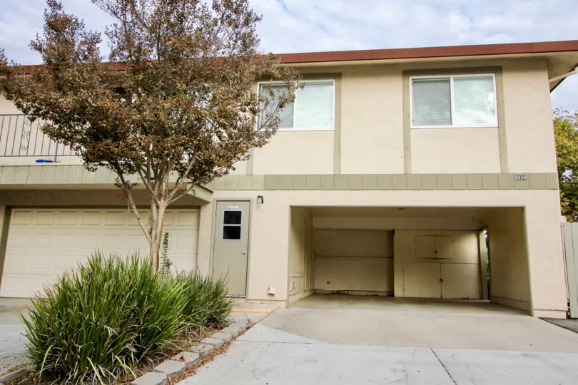 Gray door with a garage without a door inside Mission La Vega in Santee CA