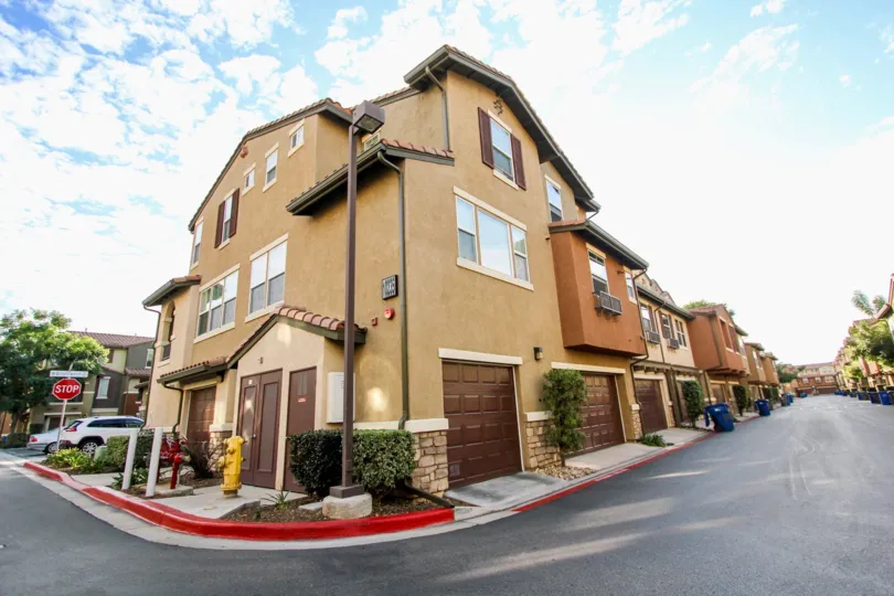 Driveway around a brown building with brown garage doors inside Morningside in Santee CA