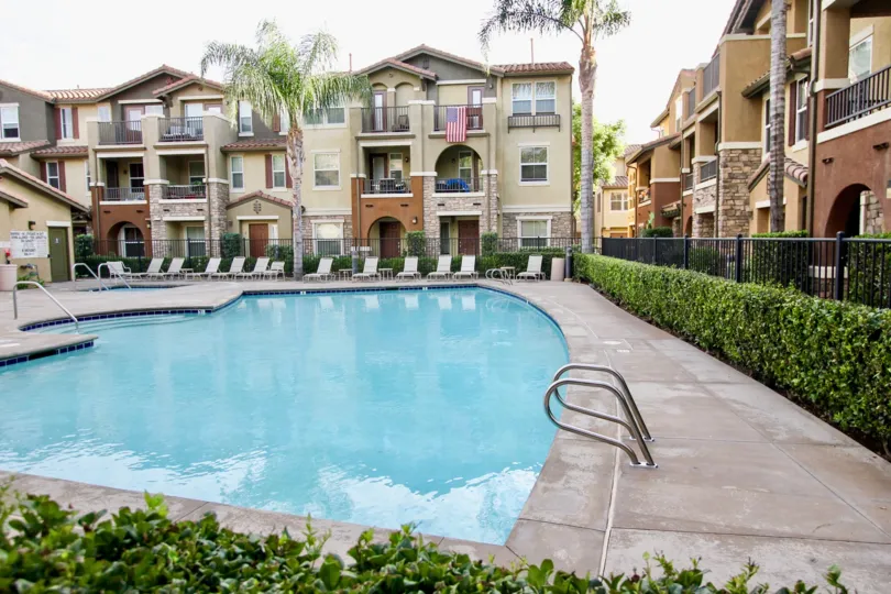 Morningside community Santee California pool hedge castle like decor balconies doors windows arches
