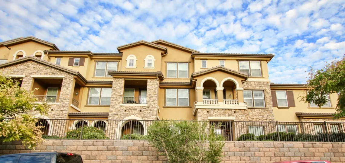 Three story residence units with stone bricks inside the Northstar in Santee CA