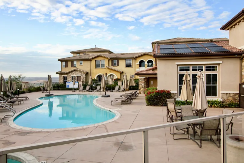 Building with pool, seating, solar panels and amazing view