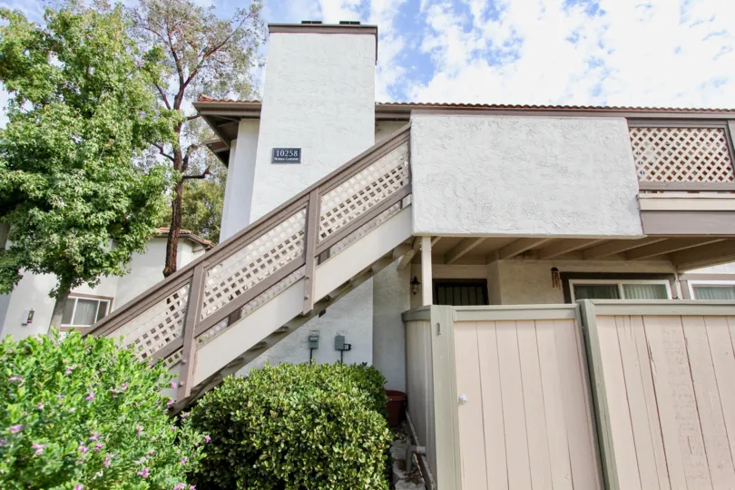 An enclosed patio with a privacy fence at the Riverwood Gardens condos/