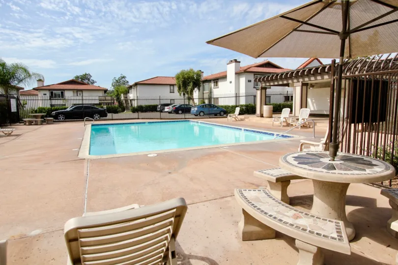 A view of a gated pool in the Riderwood Gardens community in Santee, California